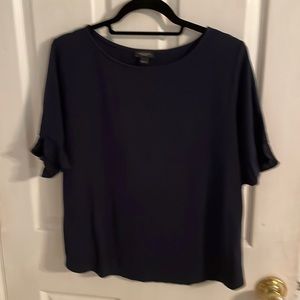 Ann Taylor navy top with ruffled sleeves. Size Large. Like new.